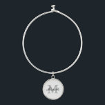 Custom monogram bangle bracelet with round charm<br><div class="desc">Custom monogram bangle bracelet with round charm.
Elegant monogrammed gift idea for women and girls.
Stylish script typography with name initial letter.
Trendy fashion accessories.
Cute wedding favour gift idea for bride,  bridesmaids,  wife,  girlfriend,  friend,  sister,  mum,  daughter etc.</div>