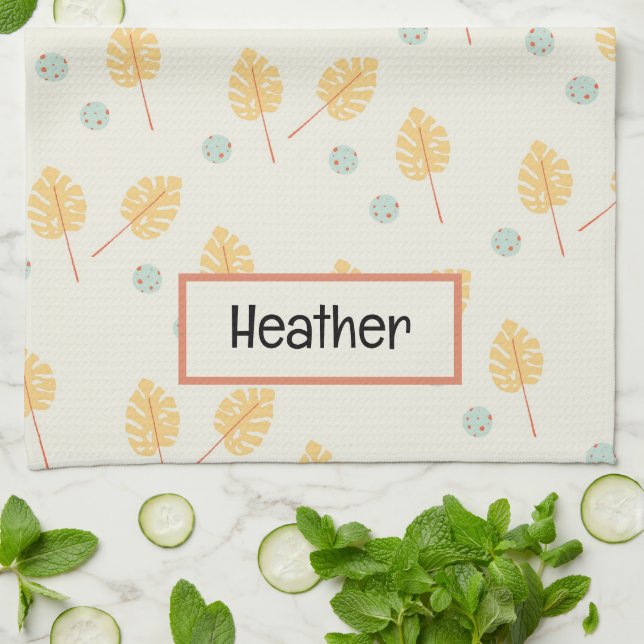 Custom name orange tropical leaves cream tea towel (Folded)