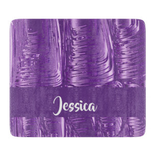 Custom name purple melting stone on cutting board