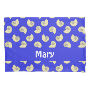 Custom name shells on blue pillowcase