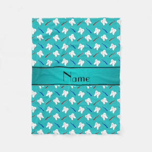 Custom name turquoise brushes and tooth pattern fleece blanket