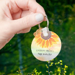 Custom Name Yoga Instructor Sunflower Key Ring<br><div class="desc">This modern botanical Yoga Instructor Keychain is decorated with a yellow sunflower on a watercolor background.
Easily customizable.
Use the Design Tool to change the text size,  style,  or color.
As we create our artwork you won't find this exact image from other designers.
Original Watercolor © Michele Davies.</div>