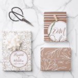 Custom Names Mocha Mousse Brown Wedding Wrapping Paper Sheet<br><div class="desc">Personalised Mocha Mousse Brown elegant floral engagement, wedding or bridal shower wrapping paper with golden and white flowers. Add your own text with easy to use Zazzle editing tool! Modern design in neutral colours. PLEASE NOTE: The gold details are imitation. No actual foil used. Visit the shop to see all...</div>