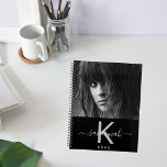 Custom photo black white monogram 2026 planner<br><div class="desc">A chic black background. Personalise and add your own photo, a name, monogram letter and a year. The name is written in white with a large modern hand lettered style script with swashes. The monogram letter in grey. Perfect for school, work or organising your personal/family life. To keep the swashes...</div>
