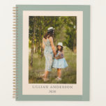 Custom Photo Cover with Sage Green Border and Name Planner<br><div class="desc">This personalised undated planner features a centred photo frame bordered by soft sage green with customisable text for name and year. Perfect for organising life at your own pace,  this flexible layout is ideal for moms,  students,  or professionals who love a personal touch with a calm,  elegant aesthetic.</div>