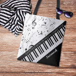 Custom Piano Music Notes Script Name Black White Tote Bag<br><div class="desc">Personalised modern, stylish music tote bag featuring a piano keyboard and music notes in your choice of colour to replace the white background. Personalise with a name or monogram and/or other text in your choice of font style, colour and size. The sample is shown black and white. The design is...</div>