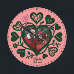 Custom Pink Green Photo Heart Clock<br><div class="desc">This unique wall clock is special because it transforms a standard timepiece into a cherished romantic keepsake by featuring your favourite couple's photo at the heart of the design. Set against a soft pink background with deep forest green decorative hearts and customisable names, it tells a distinctive story of love...</div>