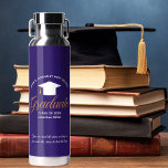 Custom Purple Graduate Class of 2025 Graduation Water Bottle<br><div class="desc">This cool purple and white custom senior graduation water bottle features classy white typography under a high school or college name for the class of 2025. Customise with your graduating year under the elegant calligraphy for a great personalised graduate party favour gift for people at the ceremony. Add your own...</div>