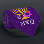 Custom Purple Monogram HANUKKAH Tie<br><div class="desc">Elegant, stylish purple HANUKKAH Neck Tie, designed with faux gold menorah, colorful Star of David and silver colored dreidel plus CUSTOMIZABLE MONOGRAM and GREETING, so you can add your initials and create your own greeting. There is a subtle tiled pattern of the Star of David in the background. Similar versions...</div>