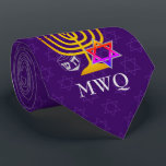 Custom Purple Monogram HANUKKAH Tie<br><div class="desc">Elegant, stylish purple HANUKKAH Neck Tie, designed with faux gold menorah, colorful Star of David and silver colored dreidel plus CUSTOMIZABLE MONOGRAM and GREETING, so you can add your initials and create your own greeting. There is a subtle tiled pattern of the Star of David in the background. Similar versions...</div>