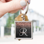 Custom Rose Gold Glitter Black Sparkle Monogram Key Ring<br><div class="desc">Easily personalise this trendy elegant keychain design featuring pretty rose gold sparkling glitter on a black brushed metallic background.</div>