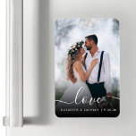 Custom Wedding Photo Love White Script Magnet<br><div class="desc">Celebrate your wedding with this keepsake flexible magnet, featuring the word "love" in elegant white handwriting script with swashes at the beginning and end. Personalise it with your names and wedding date, and replace the sample image with your favourite wedding photo. A black gradient filter helps make the text pop....</div>