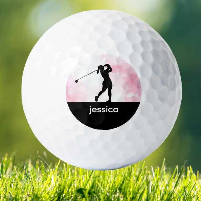Custom Woman Golf Balls (Chic pink watercolor golf ball with woman golfer design, custom monogram, and stylish feminine flair)