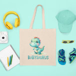 Customisable Babysaurus Tote Bag<br><div class="desc">Carry a touch of prehistoric fun with this 'Customisable Babysaurus Tote Bag'! This delightful tote features a friendly dinosaur on the front, and it offers a special twist — a spot on the back to add your little one's name. It's the perfect accessory for parents on-the-go, library trips, or storing...</div>