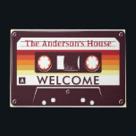 Customisable Funny Retro Cassette Mixtape Home Doormat<br><div class="desc">Add a touch of nostalgia to your doorstep with this fun doormat designed for music lovers of a certain age! Featuring a retro cassette tape graphic with a customisable label, simply choose "customise it" and select a new background colour to magically change the colour of the cassette. This vintage-style design...</div>