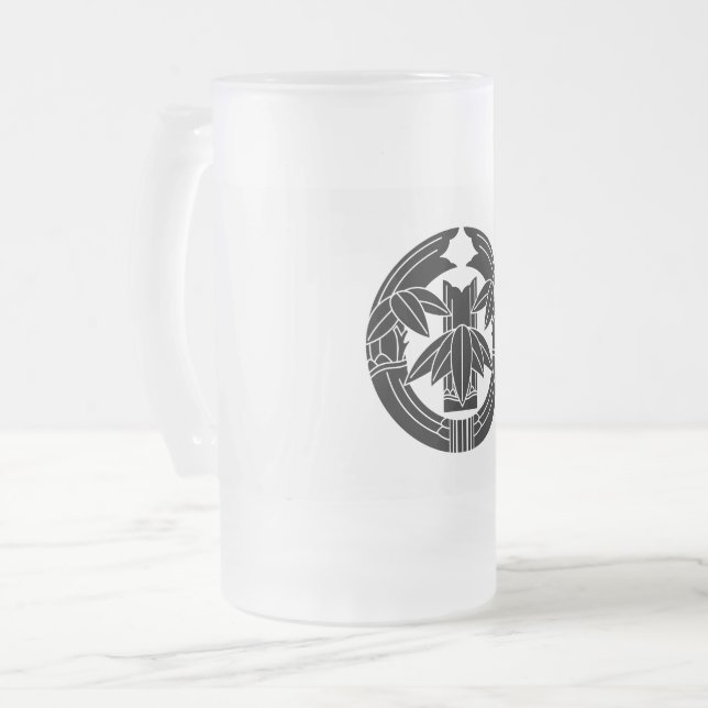 Cut bamboo in embracing bamboo leaves frosted glass beer mug (Front Left)