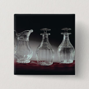 Cut glass decanters and jug, c.1840 15 cm square badge