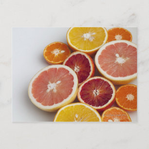 Cut Oranges on table Postcard