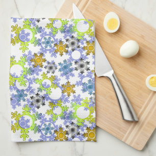 Cut paper snowflakes multicolored on white  tea towel