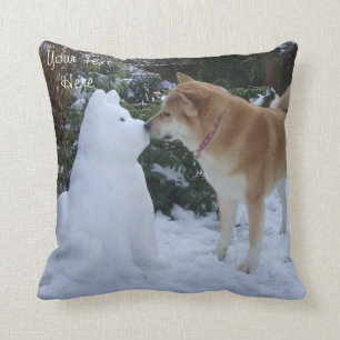 cute akita dog kissing snowdog cushion
