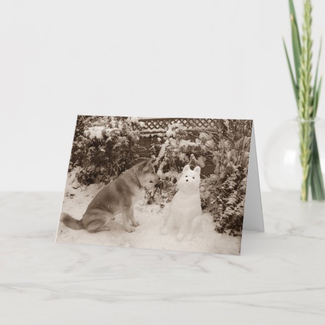 cute akita sitting in snow with snowman dog  holiday card (Front)