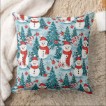 Cute and Cosy Snowman Christmas Cushion<br><div class="desc">Cute cosy snowmen in warm red scarves and warm knit hats and a pretty green,  red and blue pine tree background throw pillow.</div>