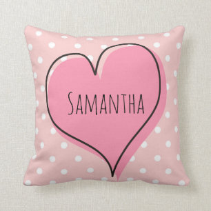 Cute and girly polka dots with a heart cushion