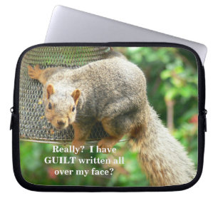"Cute and Guilty-looking Squirrel Swinging On Bird Laptop Sleeve