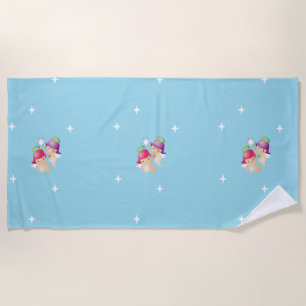 Cute angels on blue beach towel