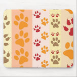 Cute Animal Paw Prints Pattern in Natural Colors Mouse Mat<br><div class="desc">A cute design with several rows of animal paw prints in natural colors like brown,  yellow,  red and orange on a striped pattern. Some paws have claws and others do not.</div>