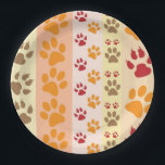 Cute Animal Paw Prints Pattern in Natural Colours Paper Plate<br><div class="desc">A cute design with several rows of animal paw prints in natural colours like brown,  yellow,  red and orange on a striped pattern. Some paws have claws and others are smooth.</div>
