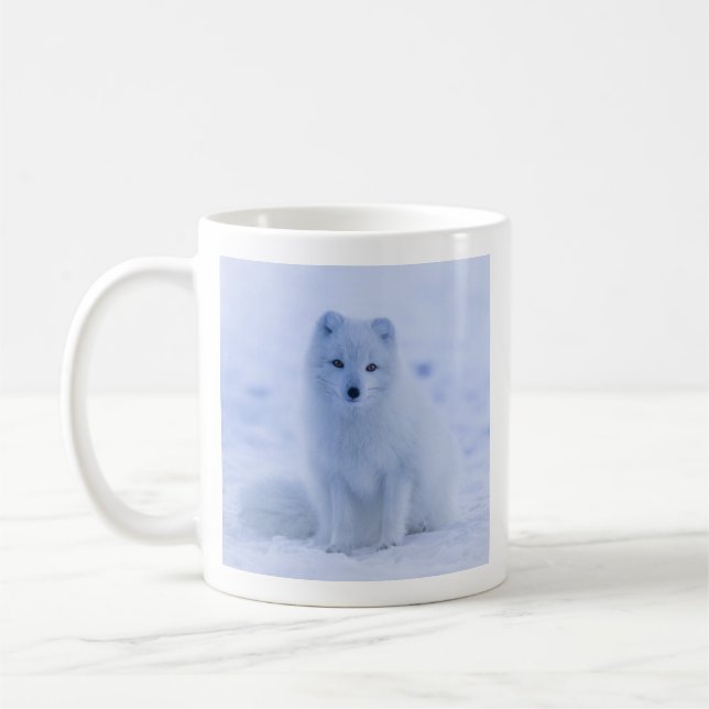 Cute Arctic Fox on Snowy Winter Background Coffee Mug (Left)