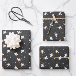 Cute astronaut cat pattern with black background wrapping paper sheet