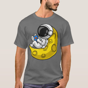 Cute Astronaut Reading Book On Moon Cartoon T-Shirt