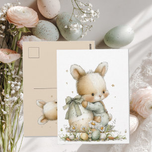 Cute baby bunny in pyjamas with an Easter egg Postcard
