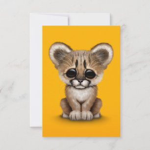 Cute Baby Cougar Cub on Yellow