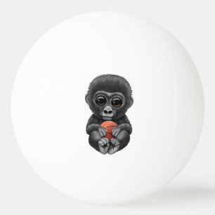 Cute Baby Gorilla Playing With Basketball Ping Pong Ball
