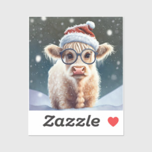 Cute baby Highland Cow In The Snow