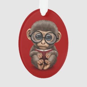 Cute Baby Monkey Reading a Book on Red Ornament