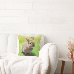 Cute baby rabbit in a flower meadow cushion