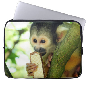 Cute Baby Squirrel Monkey Eating a Wafer Biscuit Laptop Sleeve