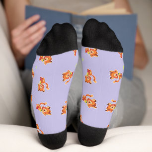 Cute baby tiger on purple socks