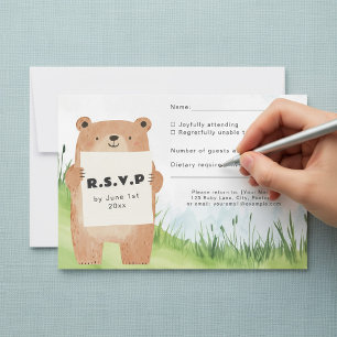 Cute bear holding sign RSVP card grass background