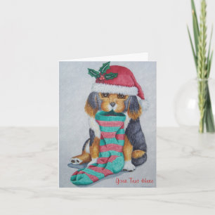 cute black and brown puppy dressed for christmas holiday card