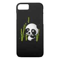Cute black and white panda bear in a bamboo grove.