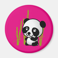 Cute black and white panda bear in a bamboo grove.