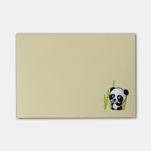 Cute black and white panda bear in a bamboo grove. post-it notes
