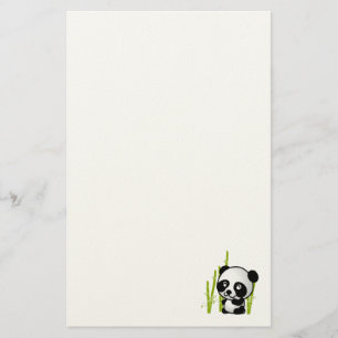 Cute black and white panda bear in a bamboo grove. stationery