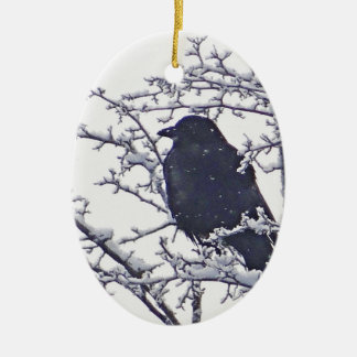 Cute black bird in snowy branches  ceramic tree decoration