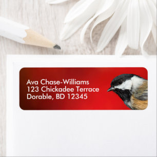 Cute Black-Capped Chickadee with Red Autumn Leaves